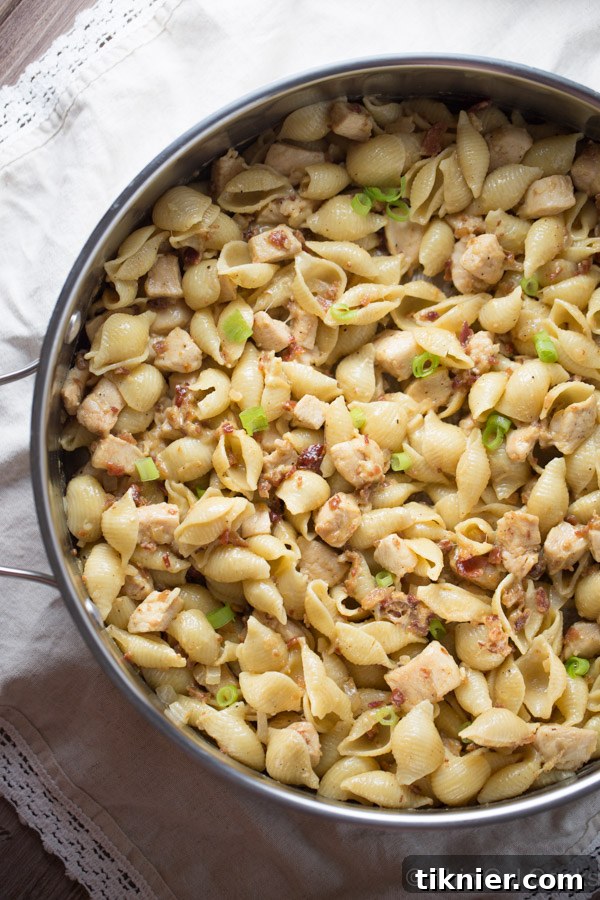 Honey Mustard Chicken Bacon Pasta Skillet 6 One Pan Chicken Bacon Honey Mustard Pasta is a delicious and simple one pot meal that's perfect for those busy weeknights. Creamy honey mustard is tossed with chicken, bacon, swiss and pasta. It's comfort food in a pan!