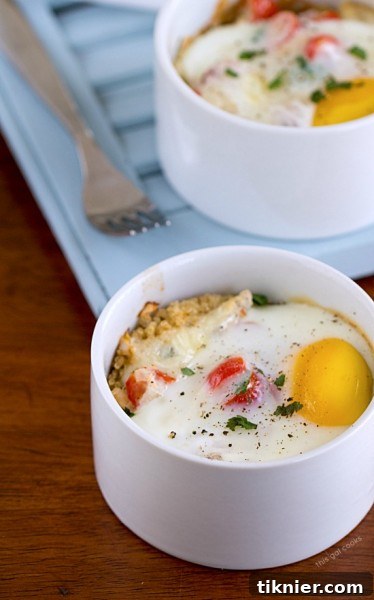 2014s Most Loved Healthy Meals 4 Baked Eggs with Quinoa and Fresh Salsa: A fresh, healthy, gluten-free, and protein-packed breakfast option by This Gal Cooks.