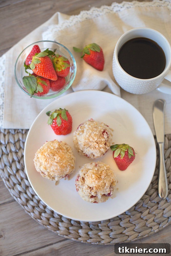 Soft and flavorful strawberry muffins made with Greek Yogurt and Coconut Oil, a delicious no-butter recipe, close up.