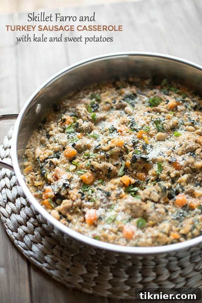 Delicious and healthy Skillet Farro and Turkey Sausage Casserole with fresh basil garnish