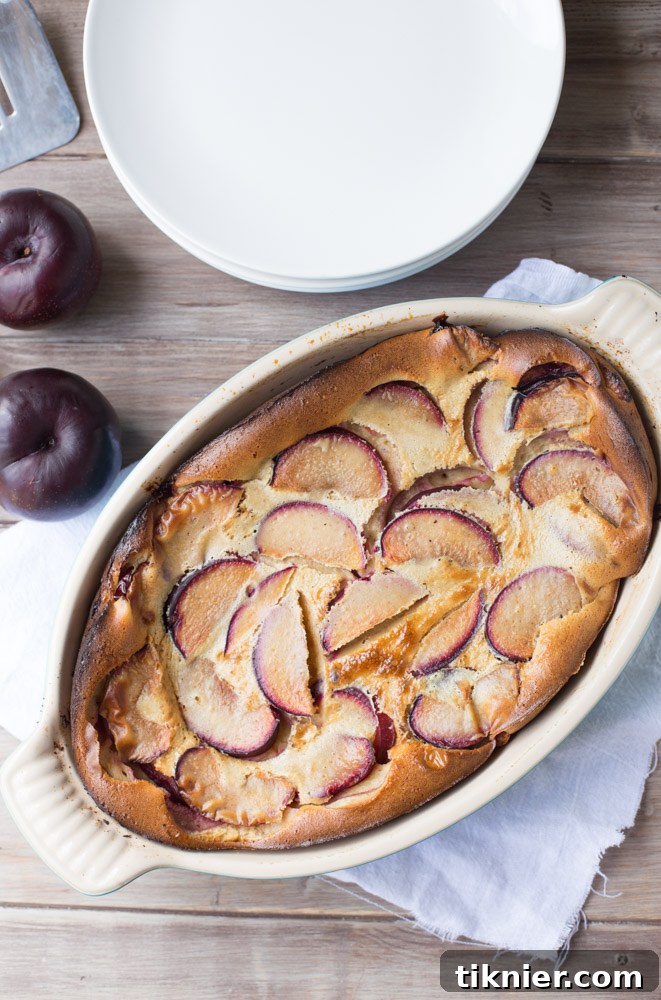 Melt in your mouth Plum Clafoutis is out of this world amazing and so easy to make, too! | This Gal Cooks