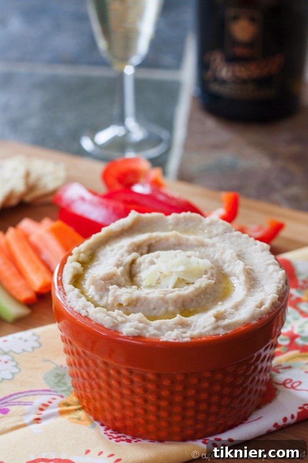 Gourmet White Truffle Parmesan White Bean Hummus, a luxurious dip.