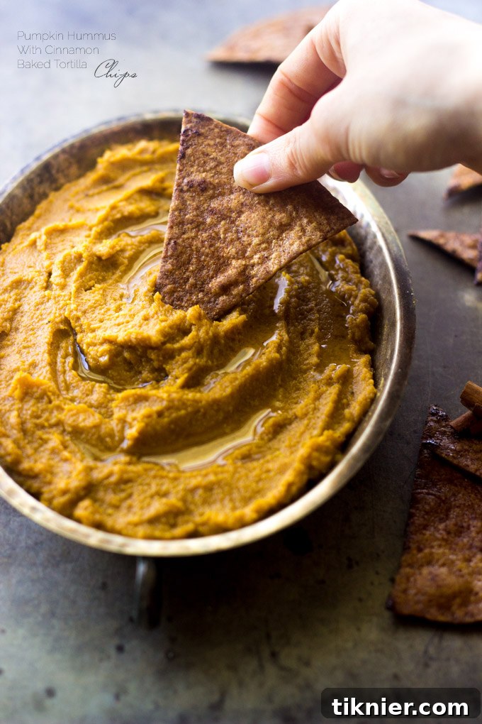 Rich and creamy Pumpkin Hummus, perfect for fall flavors.