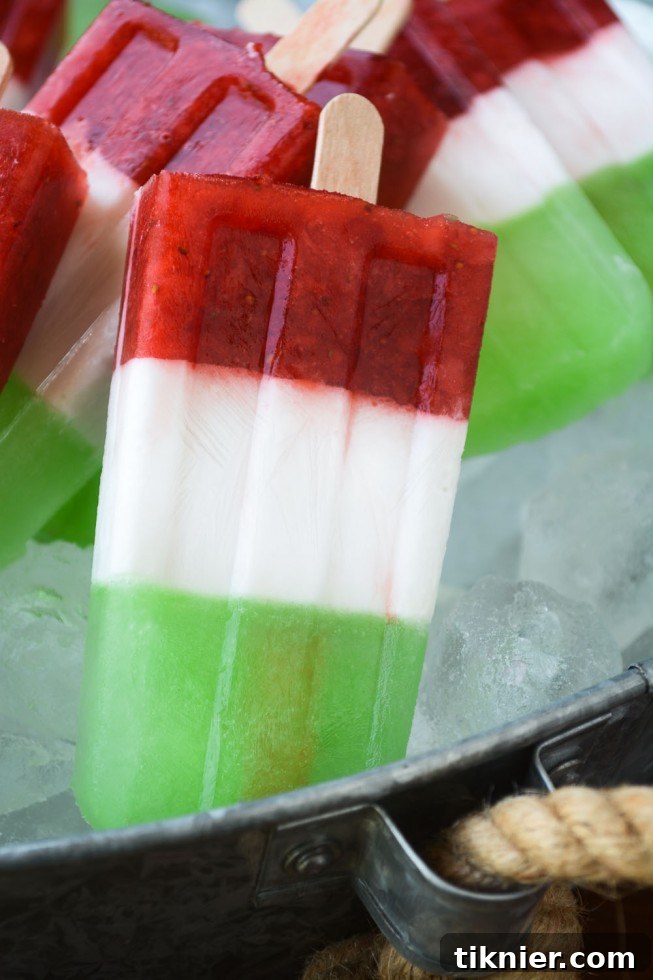 Refreshing Cinco de Mayo Popsicles with layers of vibrant fruit flavors