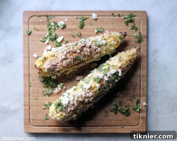 Delicious Mexican Street Corn (Elote), grilled and seasoned