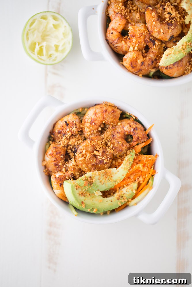 Spicy Shrimp Cucumber Noodle Bowl - A vibrant, healthy, and quick meal featuring fresh ingredients and a kick of Sriracha flavor.