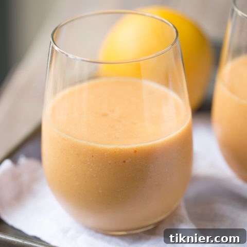 Orange Carrot Protein Smoothie in a glass