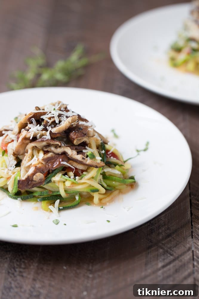 Zucchini Noodles with Shiitakes and Tomato Sauce - Pin this recipe for later!