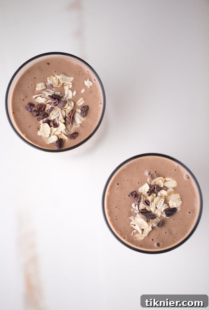 Close-up of a creamy and thick Chocolate Peanut Butter Smoothie, dairy free and vegan, with superfoods.