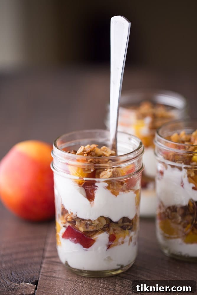 These delicious Roasted Nectarine Greek Yogurt Parfaits are simply made with fresh, juicy nectarines, homemade vanilla almond granola and Greek yogurt. | Small Green Kitchen