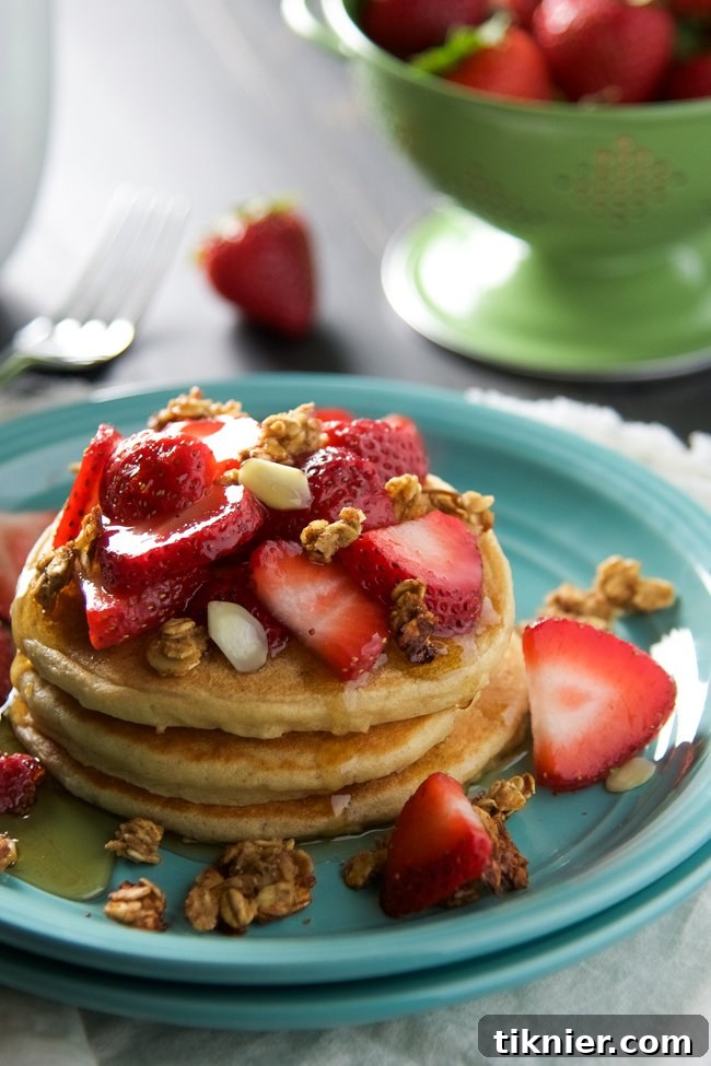 Fluffy Vanilla Greek Yogurt Pancakes, a delightful and airy breakfast treat.