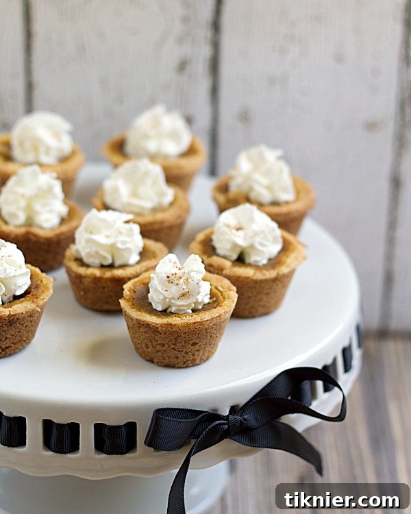 8 Cozy Pumpkin Desserts for Fall 6 Pumpkin Pie Cookie Cups - Small, individual dessert cups filled with pumpkin pie