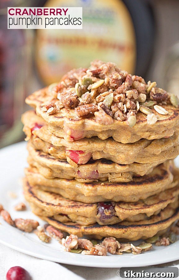 Cranberry Pumpkin Pancakes, a delightful fall-inspired breakfast stack