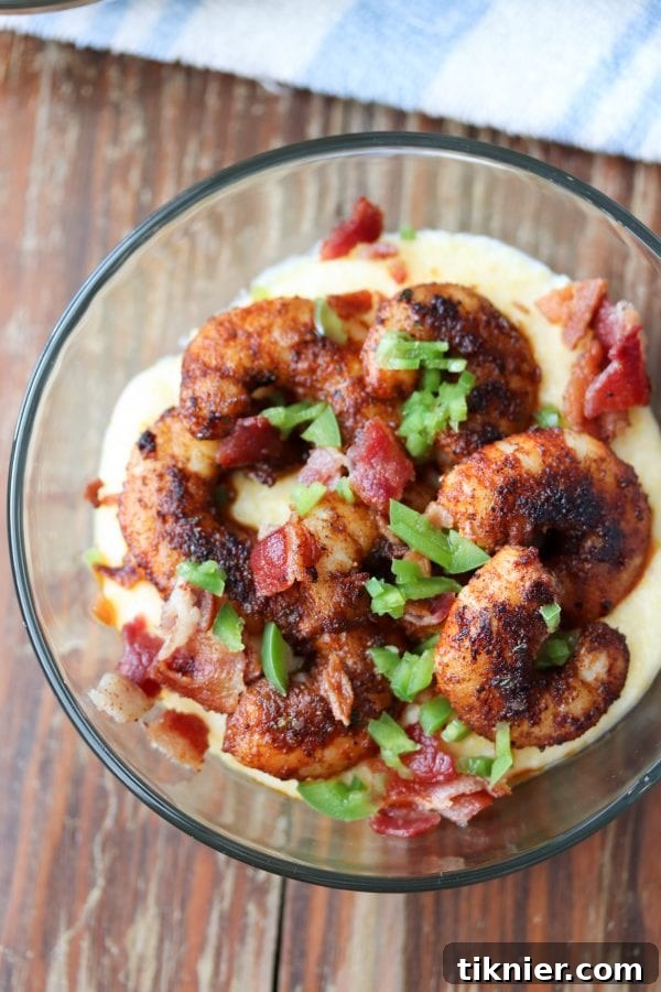 Blackened Shrimp & Smoked Gouda Grits 3 Flavorful blackened shrimp and grits made with smoked gouda cheese are a perfect quick and easy meal! Full of BOLD flavors. You can't beat a bowl of creamy cheese grits topped with shrimp and bacon.