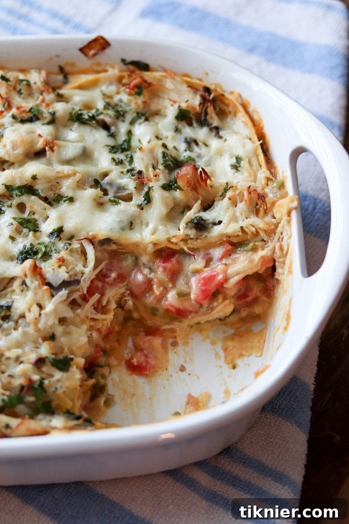 King Ranch Chicken Casserole served with a side of green salad, ready to enjoy. A comforting and easy chicken recipe for dinner.