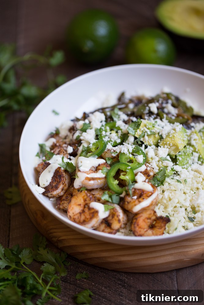 Shrimp Fajita Bowls with Cilantro Lime Cauliflower Rice - a vibrant, healthy, and low carb meal by This Gal Cooks.