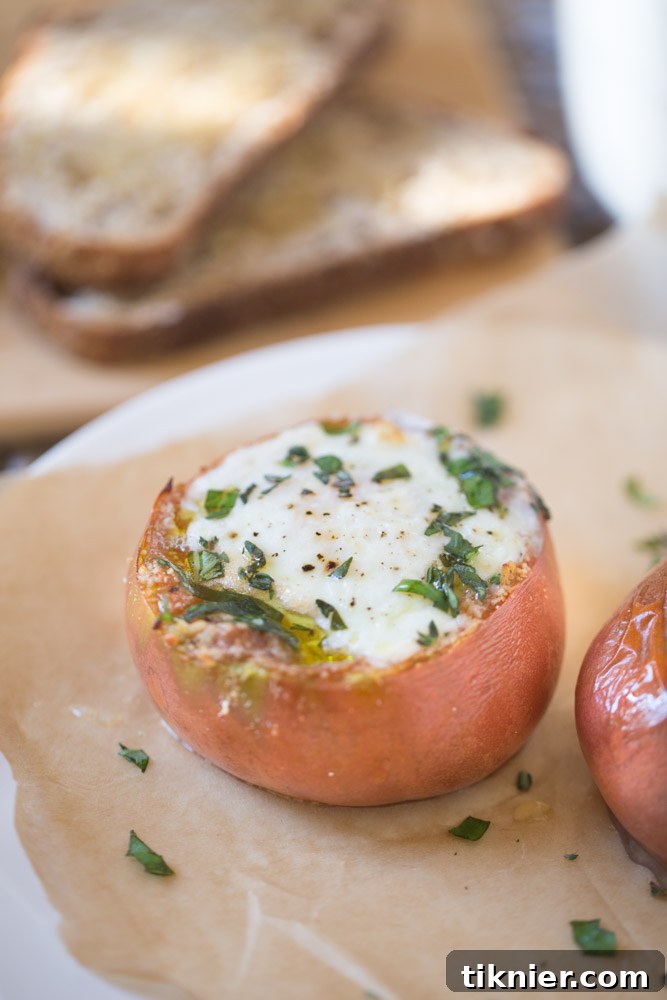 Rustic Heirloom Tomatoes with Baked Eggs, a simple and elegant low carb breakfast or brunch recipe.