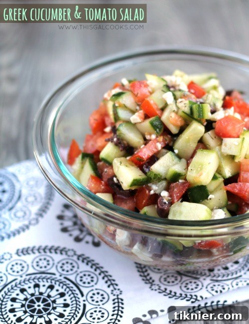 Refreshing Greek Cucumber Tomato Salad, a healthy and vibrant low carb side dish or light meal.