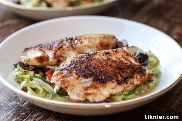 Delicious and healthy Mediterranean seasoned Black Sea Bass with grain-free zucchini noodles