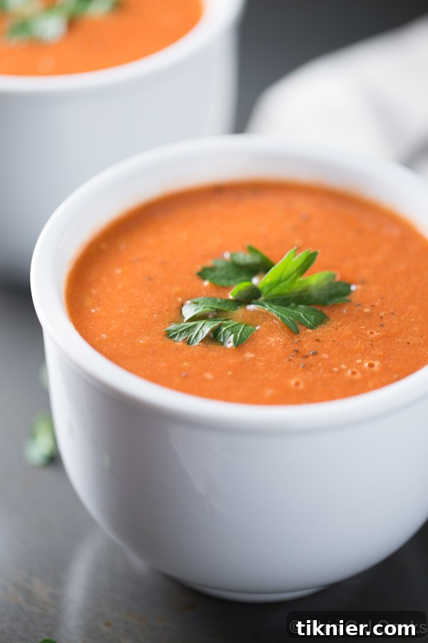 Roasted Tomato Soup is made with fresh roasted tomatoes, thyme and balsamic vinegar. Half and Half is added for a boost of low calorie creaminess!