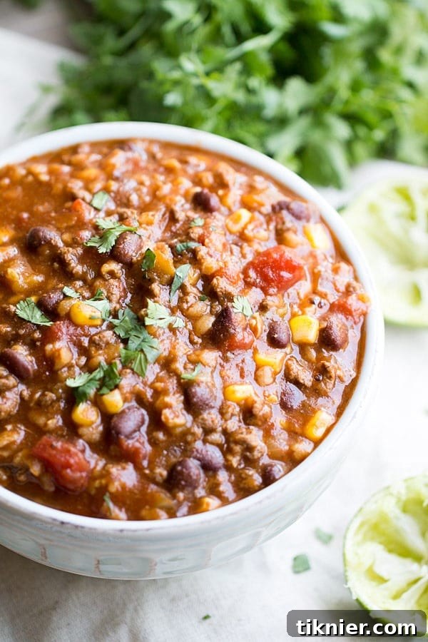 A vibrant and savory Slow Cooker Tex Mex Soup, perfect for an easy weeknight dinner.