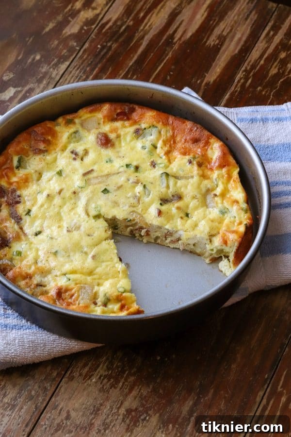 Low Carb Breakfast Casserole with Bacon and Zucchini, perfect for easy meal prep. Made with bacon, zucchini, onions, and cheese, it's a delicious and healthy breakfast option. #lowcarb #breakfastcasserole #keto #mealprep #bacon #zucchini