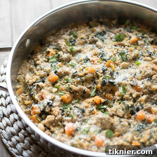Skillet Farro and Turkey Sausage Casserole - A hearty and healthy one-pan meal featuring tender farro, savory turkey sausage, and nutritious kale. Perfect for a comforting dinner. | This Gal Cooks