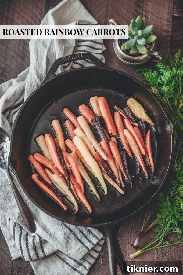 Golden Roasted Rainbow Carrots with Creamy Carrot Puree 6 A beautifully plated serving of roasted rainbow carrots, emphasizing their tender texture and vibrant appearance.