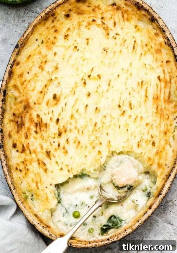 A savory Gluten-Free Fish Casserole with mashed potatoes and tender vegetables.