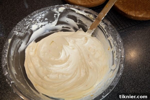 Creamy, fluffy cream cheese frosting for Hummingbird Cake.