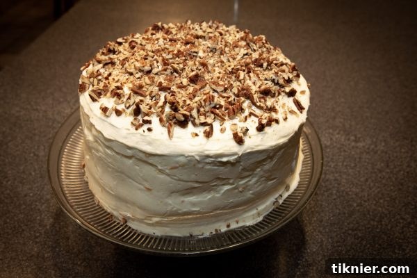 A beautifully frosted Hummingbird Cake, ready to be served.