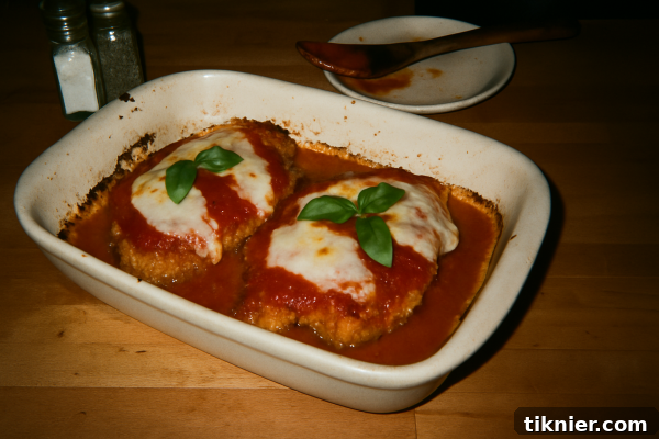 Crispy Southern-Style Chicken Parmesan, freshly baked with melted mozzarella and marinara sauce