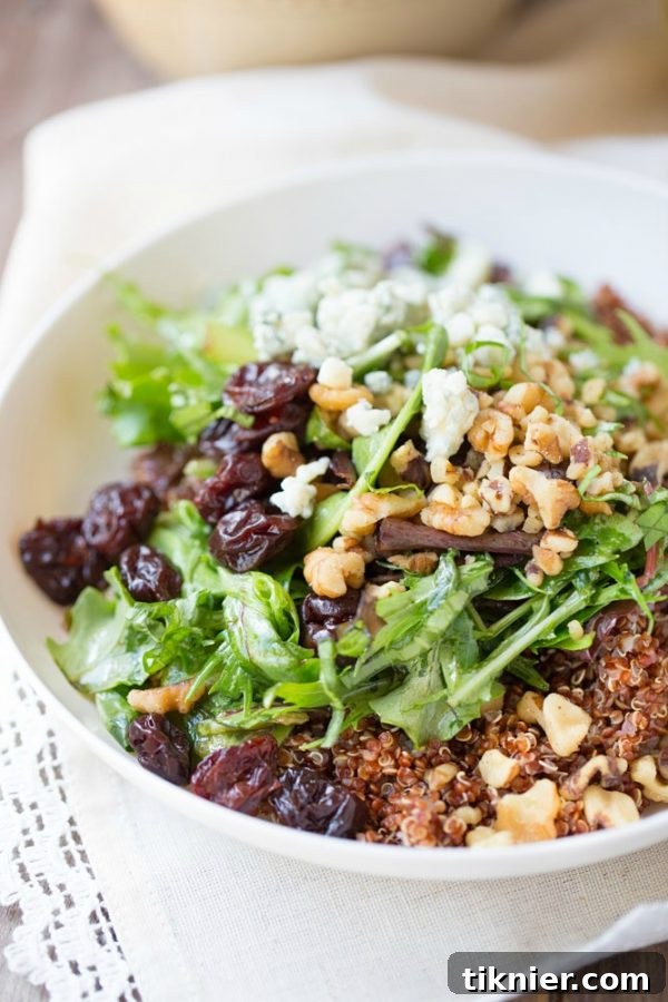 A refreshing Baby Greens and Quinoa Salad with Honey Balsamic Vinaigrette, a light and healthy meal for tired days.