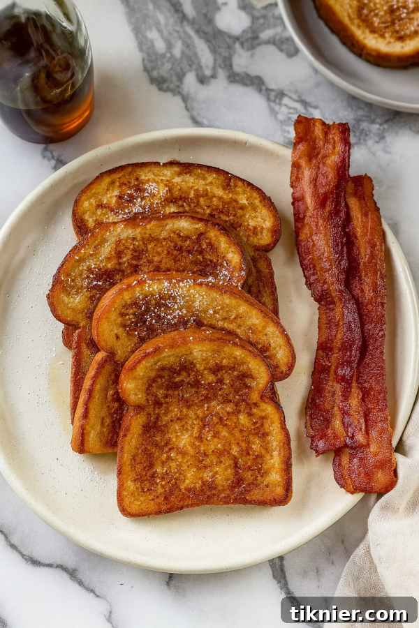 Golden French Toast Stack with Berries and Syrup