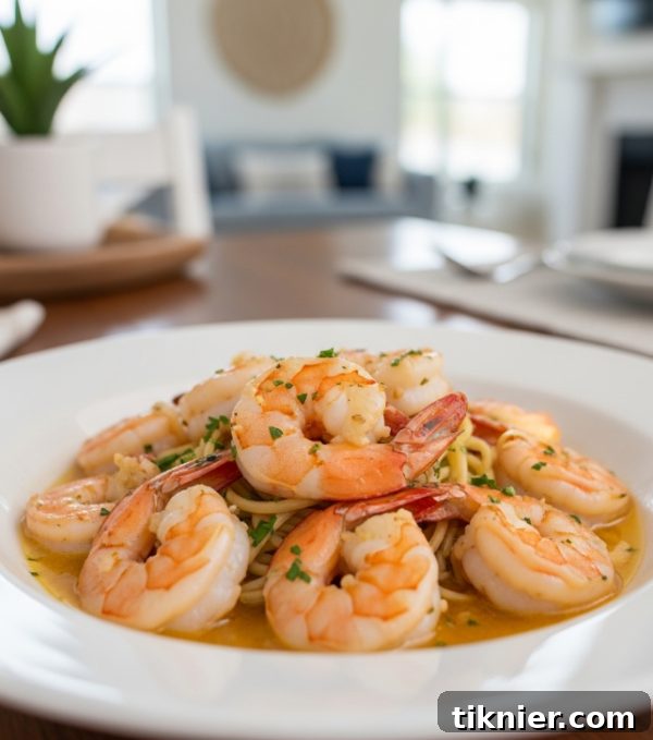 Garlic Butter Shrimp Scampi with Bright Lemon 2 Delicious Shrimp Scampi served over pasta with lemon and parsley.