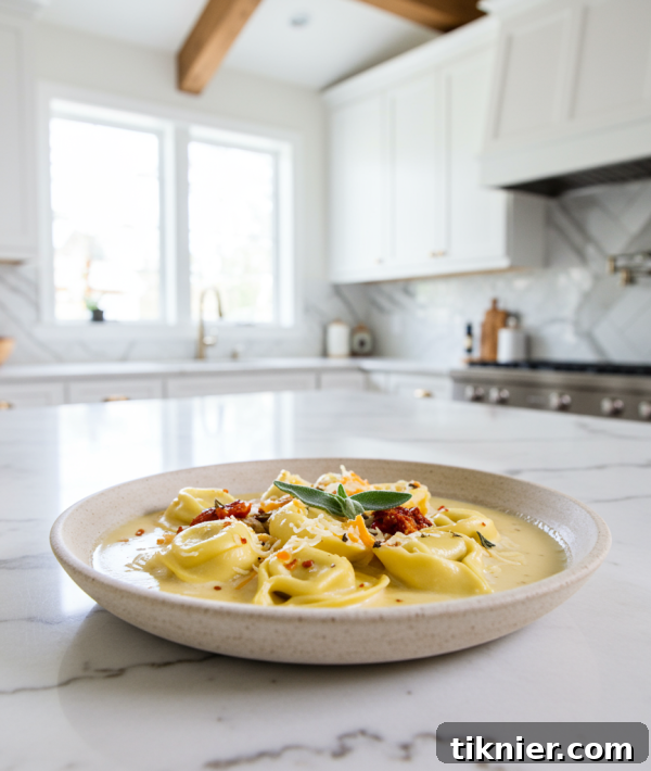 Creamy Chicken Tortellini Soup with Smoked Gouda and Crispy Sage