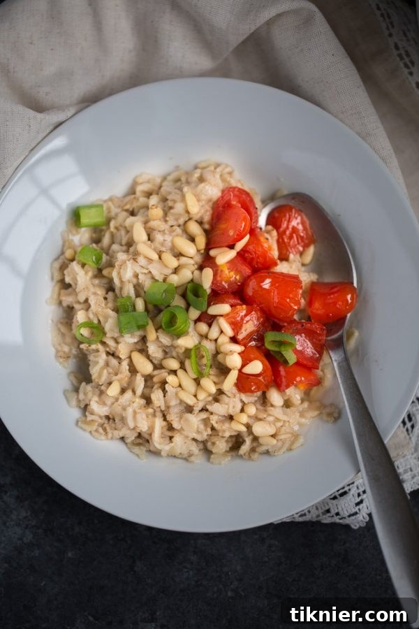 Savory oatmeal with a fried egg and chives