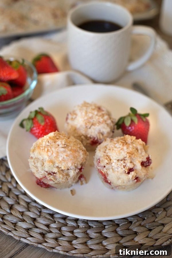 Soft and flavorful strawberry muffins made with Greek Yogurt and Coconut Oil