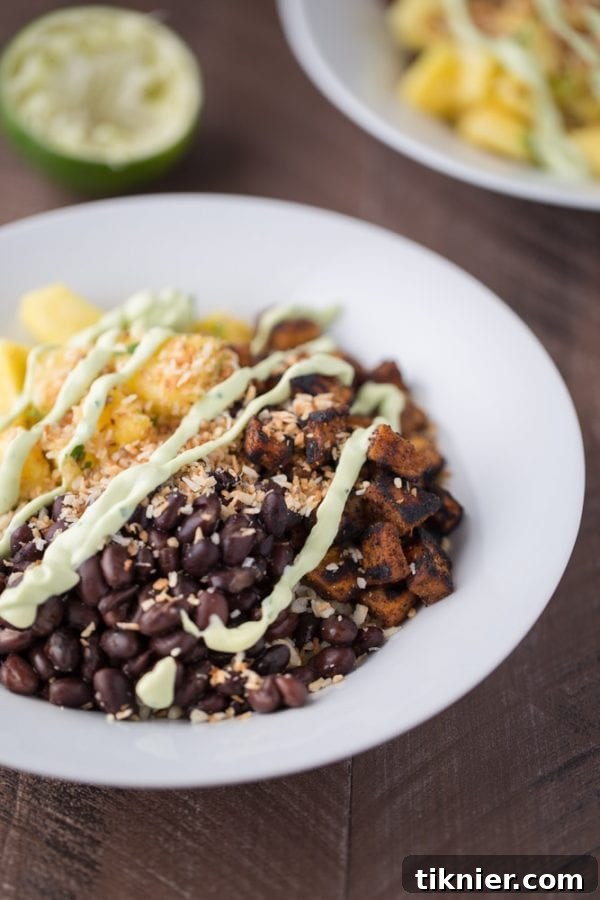Vibrant tropical sweet potato burrito bowl, an egg-free breakfast