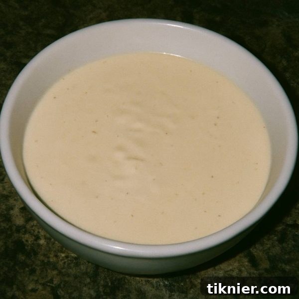 Creamy Homemade Olive Garden Alfredo Sauce on Fettuccine