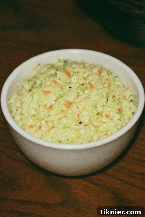 Homemade KFC Coleslaw on a hot summer day, served with crispy fried chicken
