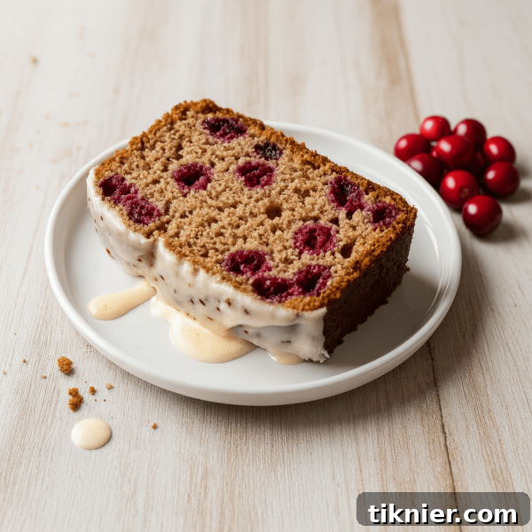 Delicious brown butter vanilla cranberry loaf, perfectly glazed and ready to serve.