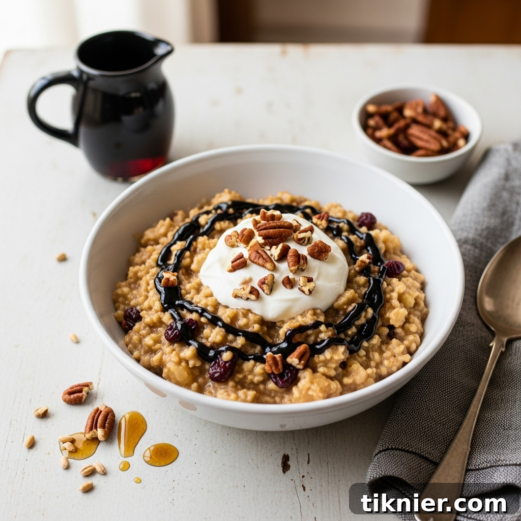 A comforting bowl of Apple Cranberry Einkorn Porridge with a drizzle of balsamic vinegar