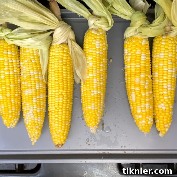 A close-up of a bowl of rich, creamy brown butter creamed corn, a comforting side dish.