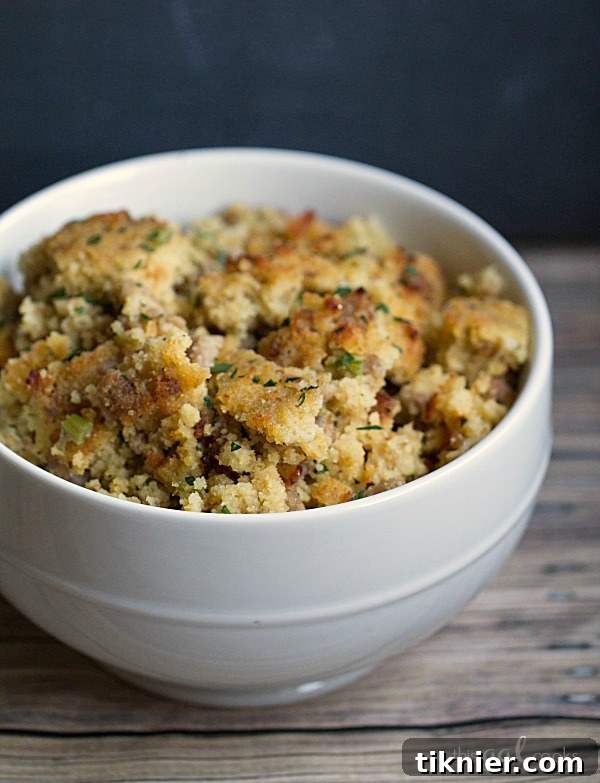 A dish of homemade cornbread dressing with herbs, a Southern Thanksgiving classic.