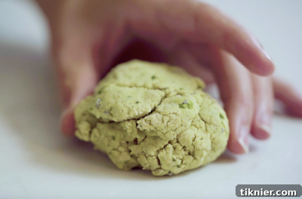 A basket of homemade honey biscuits, warm and soft, ready for serving.