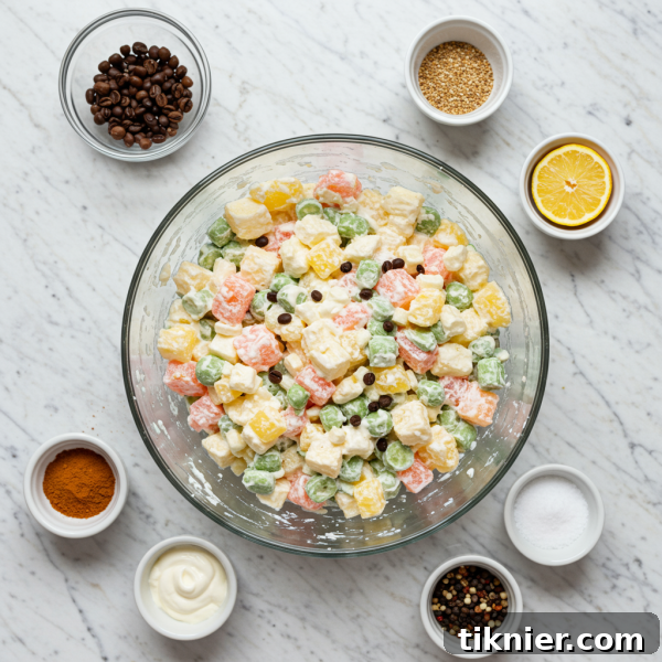 A colorful fresh fruit salad with berries and citrus, perfect as a refreshing Thanksgiving side.