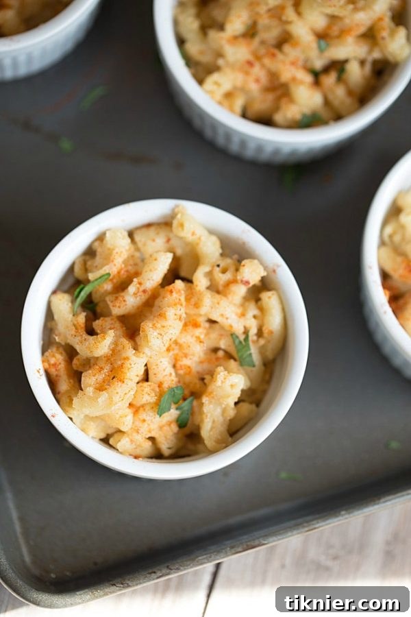 A bowl of rich, creamy homemade mac and cheese, made with simple pantry ingredients for a comforting and cheap lunch.