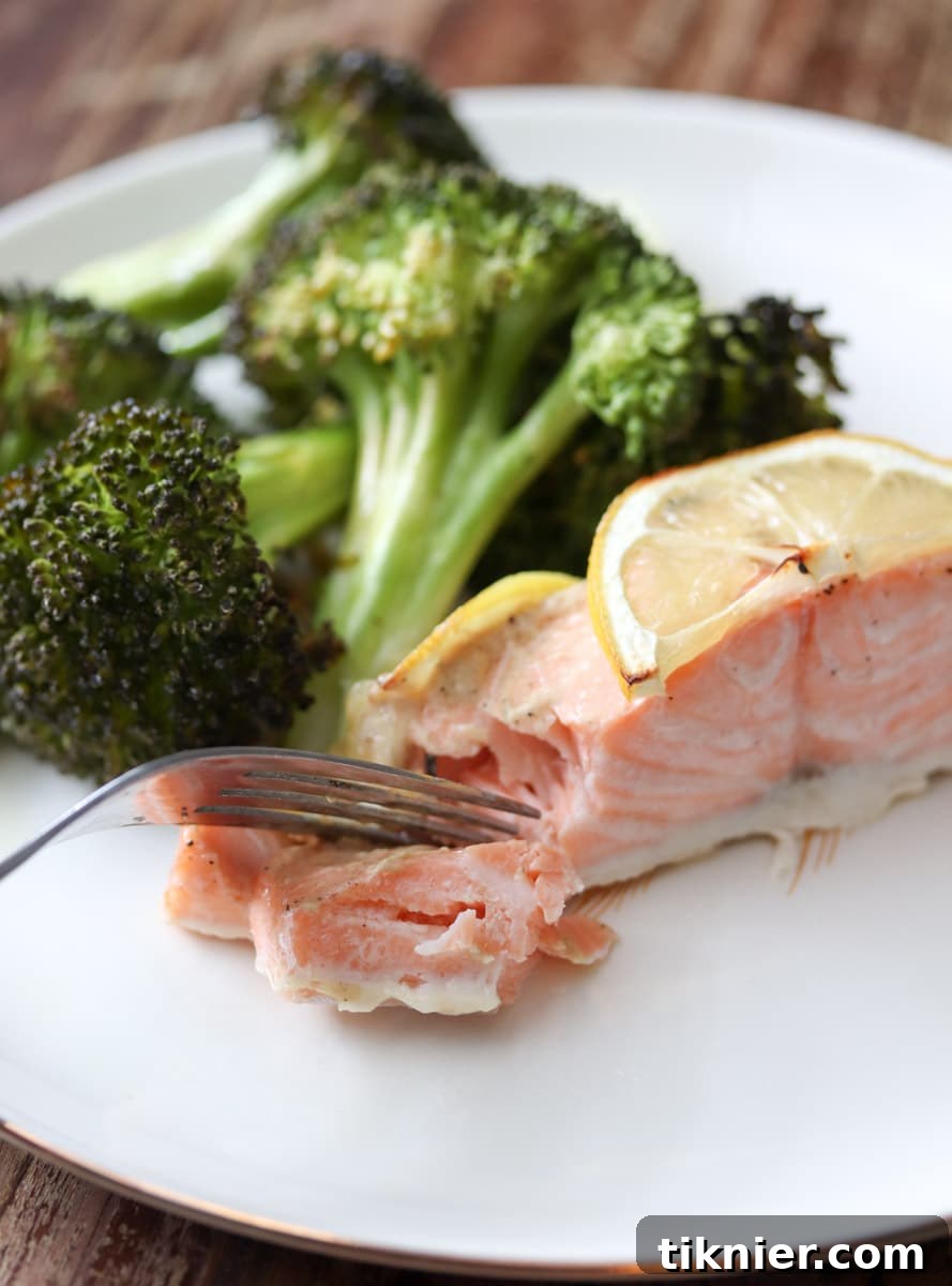 Lemon Dijon Sheet Pan Salmon with Broccoli is an easy cleanup, healthy low carb dinner recipe! If you're watching your carbs and/or eating clean then this recipe is for you! #lowcarb #keto #paleo #realfood #glutenfree #healthyfood