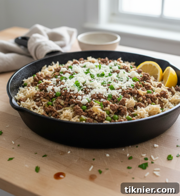 Ground Beef and Rice Skillet topped with Feta and Parsley